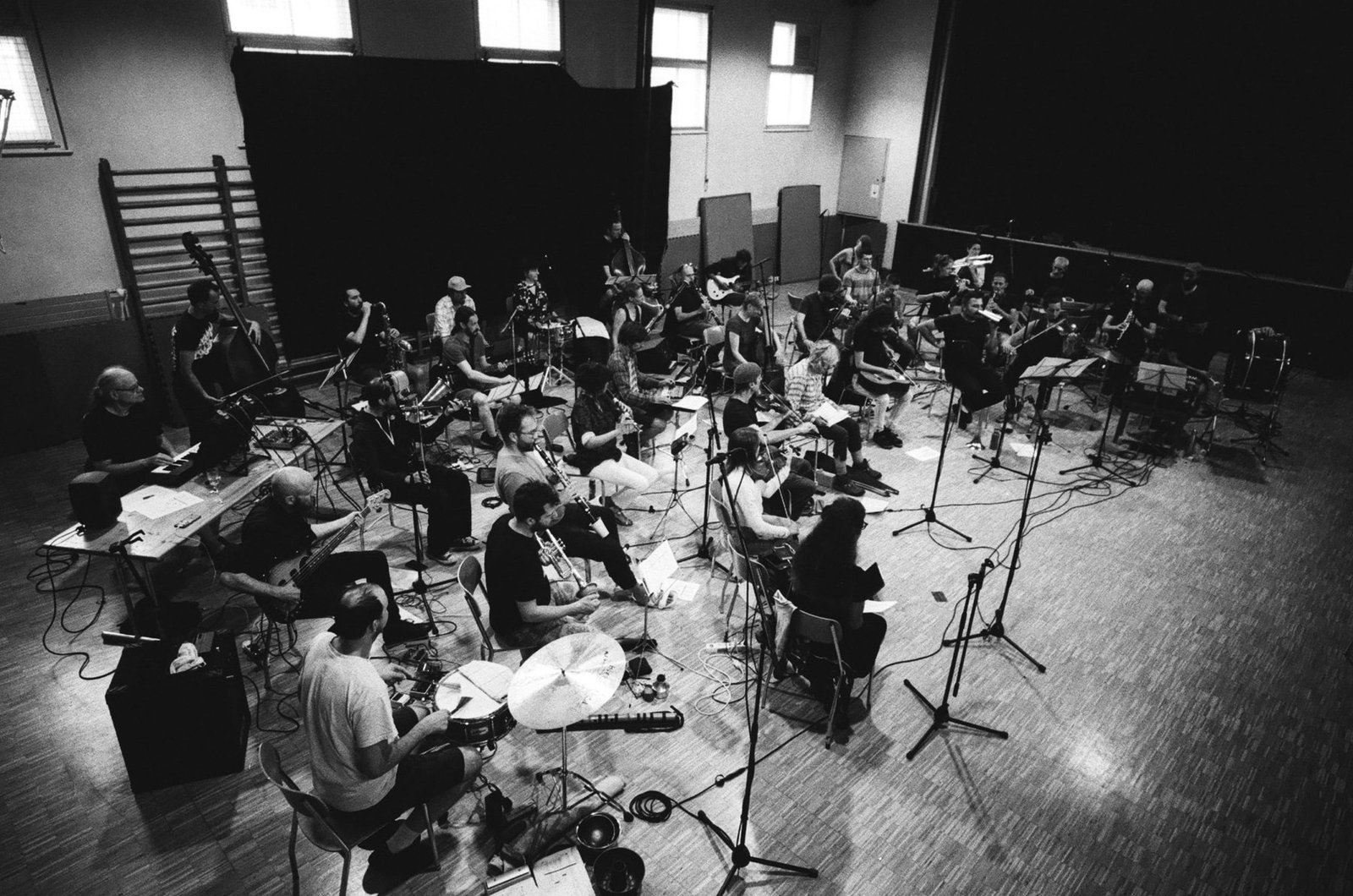The Insub Meta Orchestra in rehearsal, seen from above, black and white