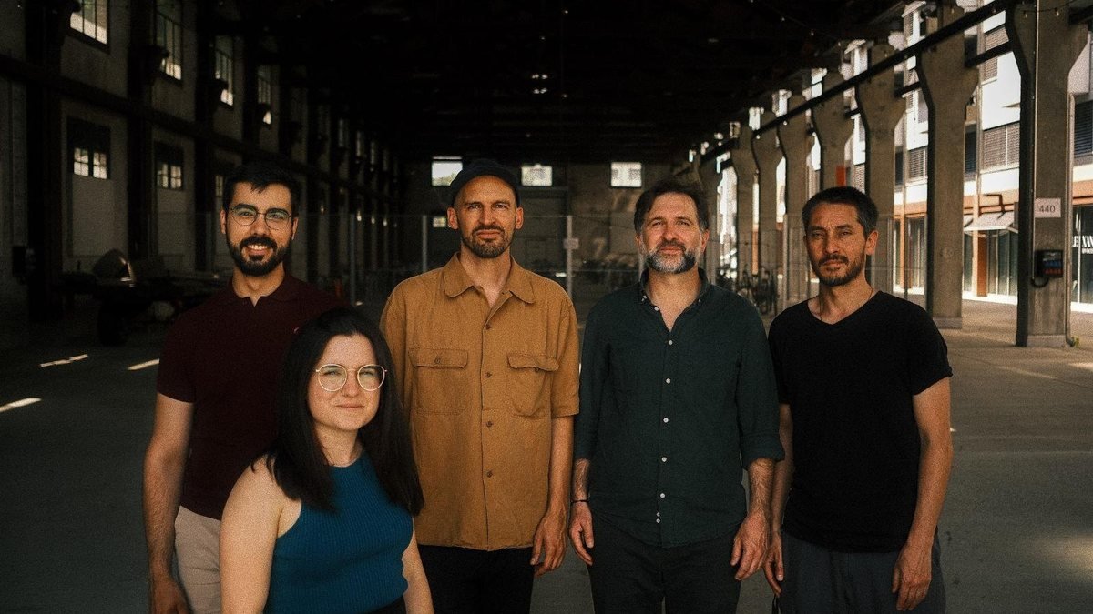 The Slide Ensemble in 2026 in a large industrial hall